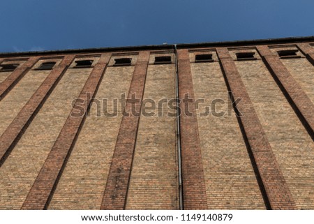 Symmetric old brick building