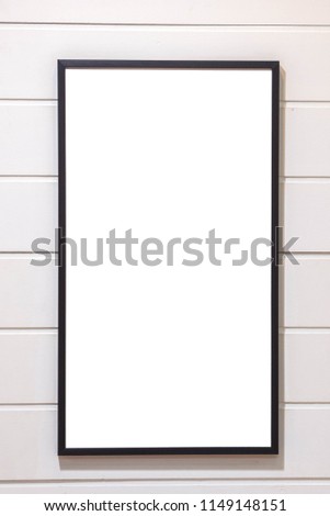 blank Photo frame on wood wall 
