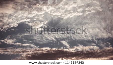 Dramatic clouds in the sky Royalty-Free Stock Photo #1149169340