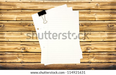 paper page notebook on brown wooden background