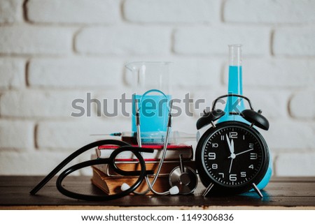 retro alarm clock on wooden table