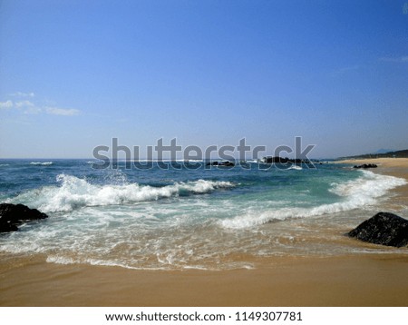 Blue Clear Sky And Ocean View From The Shore