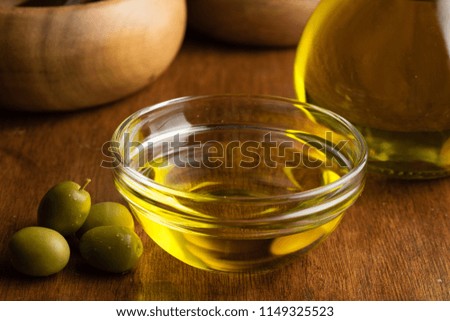 Extra virgin olive oil in glass transparent bowl