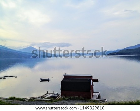 The quiet serene waters of Norris Point in Gros Morne National Park, Newfoundland and Labrador, Canada
