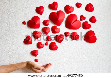 A red heart that gushes a lot on a white background