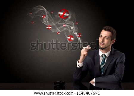 Businessman smoking with colored no smoking symbols nearby.