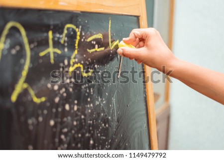schoolboy decides to example at the blackboard