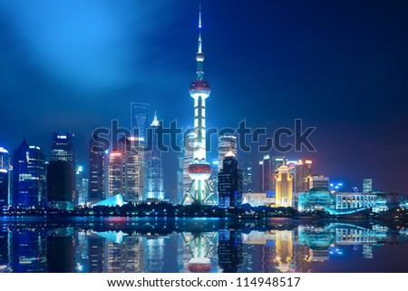 night shanghai skyline with reflection ,beautiful modern city