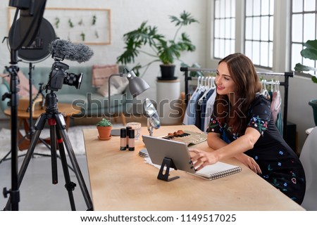 Woman recording content for her lifestyle blog vlog, modern businesswoman using social media for marketing Royalty-Free Stock Photo #1149517025