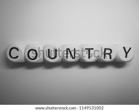 word country spelled on dice