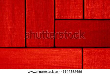 Bloody red wooden boards, battens, fence, blocks, bars.