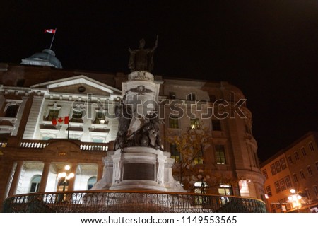 francois de laval monument in front of old central postal office in upper town of quebec city, canada