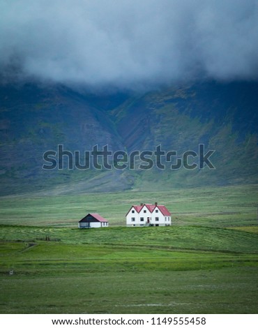 A farm house located deep within northern Europe, this house has a beautiful mountain backdrop and endless prairies around it. 