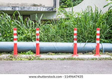 Pipes for stopping or slowing down cars for the safety of all people