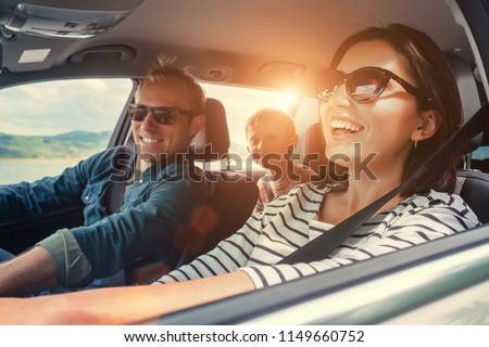 Happy family ride in the car Royalty-Free Stock Photo #1149660752