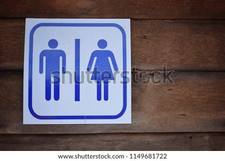 Male bathroom sign, female in public.