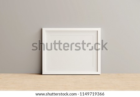 Blank black color picture frame template for place image or text inside on the wall.