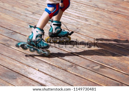 roller skating rollerblading on inline skates sport in park.