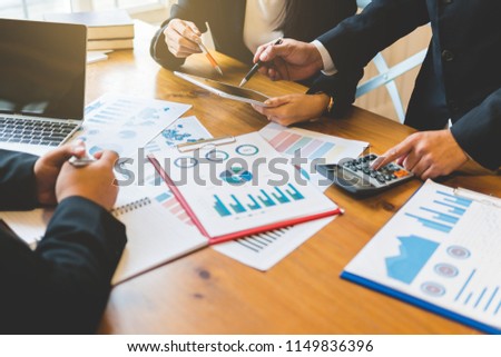 Business People Meeting working in office for discussing documents and ideas , with soft focus, vintage tone
