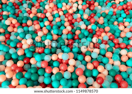 lot of plastic and colored balls in a chaotic manner