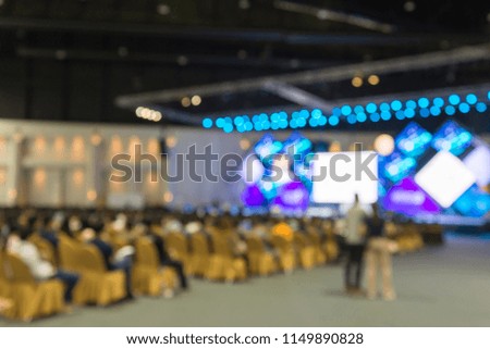 Abtract blur people in conference seminar presentation at conference exhibition hall background