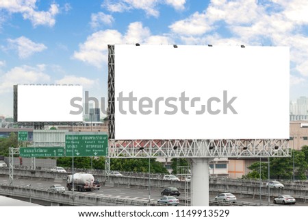 Advertising concept, Blank template for outdoor advertising or blank billboard on the highway in city. With clipping path on screen - can be used for trade shows, promotional poster.