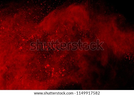 Abstract of red powder explosion on black background. Red powder splatted isolate. Colored cloud. Colored dust explode. Paint Holi. Royalty-Free Stock Photo #1149917582