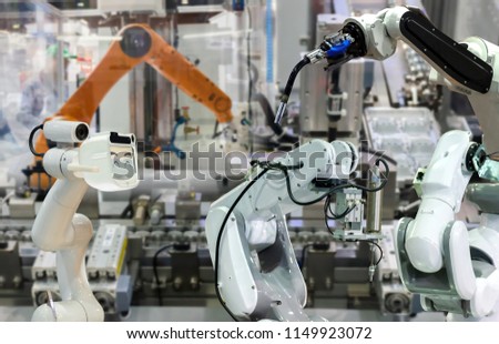 Robot replacement Industrial 4.0 of things technology robot future arm and man using controller for control electronic
