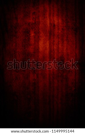 A red & black grungy wallpaper design with a dark vignette border. 