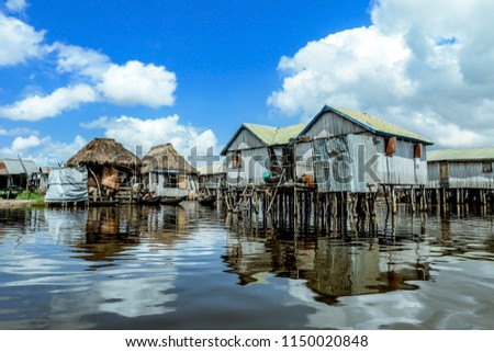 Houses on the lake village Ganvie, Benin, Africa Royalty-Free Stock Photo #1150020848