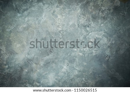 Gray lighted wall texture for designer background. Painted surface.