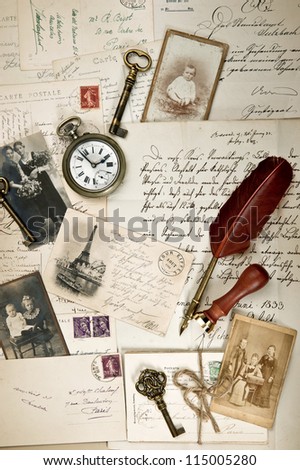 nostalgic vintage background with old post cards, letters and photos. collage. artwork