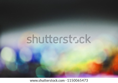 Blurred stage lights equipment with multicolored beams.  Entertainment concert  bokeh lighting. Blurred background of night bokeh concert. Stage lights on concert.
