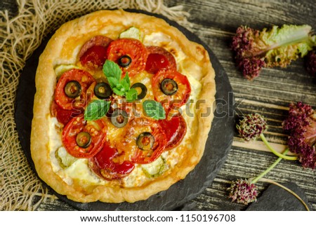 Fast food pizza italian traditional on wooden table. Pepperoni pizza on wooden board 