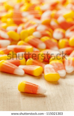 Halloween Striped Candy Corn against a background