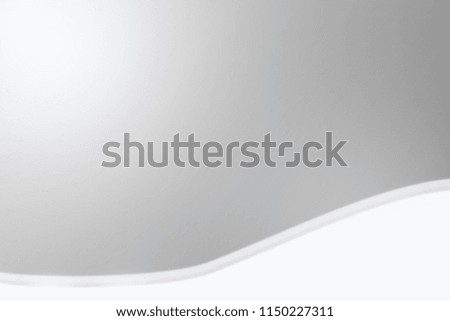 Abstract white and gray background Freeform With overlapping curves and gradients.