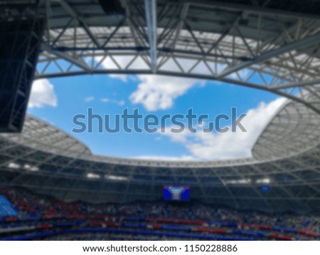 Blurred football stadium and use as a background