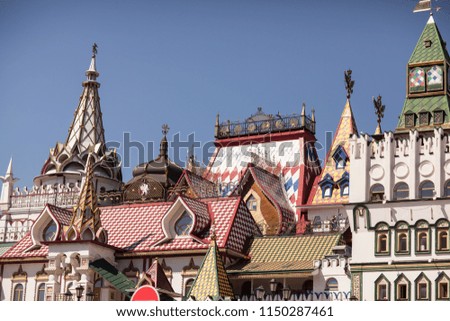 Colored vintage roofs of houses in the Russian style