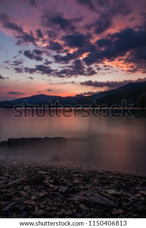 Photos of a sunset over the serre poncon lake, south France