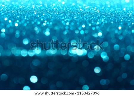 blue abstract background with bokeh defocused lights christmas