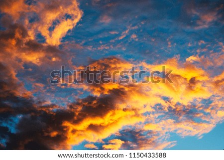on this great picture you can see the beautiful sunset over hua hin thailand. the clouds shine in rich red and orange