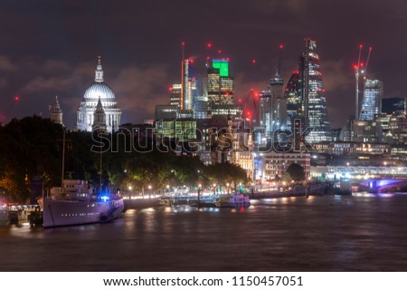 St. Paul's Cathedral and other London towers from across the Thames at night