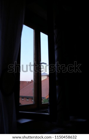 window with church view
