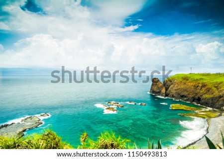 Beautiful blue ocean with beach and blue sky , white cloud in Taiwan