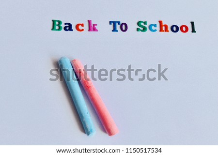 Back to school plain white background .editing space. Paper pens book calculation.lettering