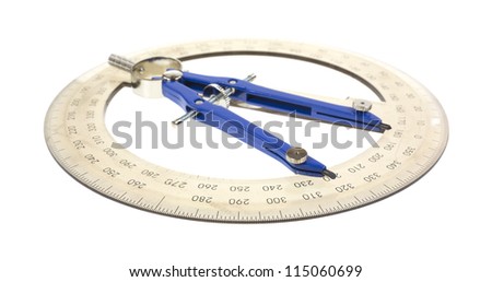 A small drafting compass atop a plastic protractor on a white background.