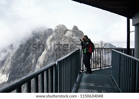 Austrian Alps-outlook of the photographer and Alps from Dachstein