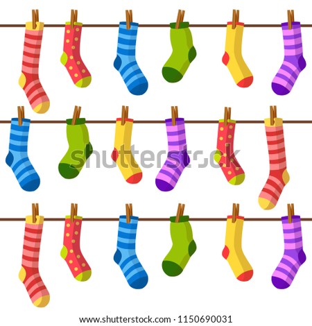 Bright vector seamless pattern with socks hanging on a rope. Cute multicolored clothes. Cartoon summer background 
