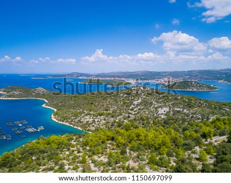 Beautiful aerial photo of Razanj in Dalmatia, Croatia, Europe. Nice nature and landscape on warm sunny summer day at Adriatic Sea and coast. Lovely seascape and outdoors shoot with drone from above.