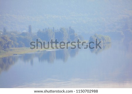 beautiful nature with lake and forest in the morning 